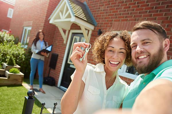 Happy Residents moving into a home