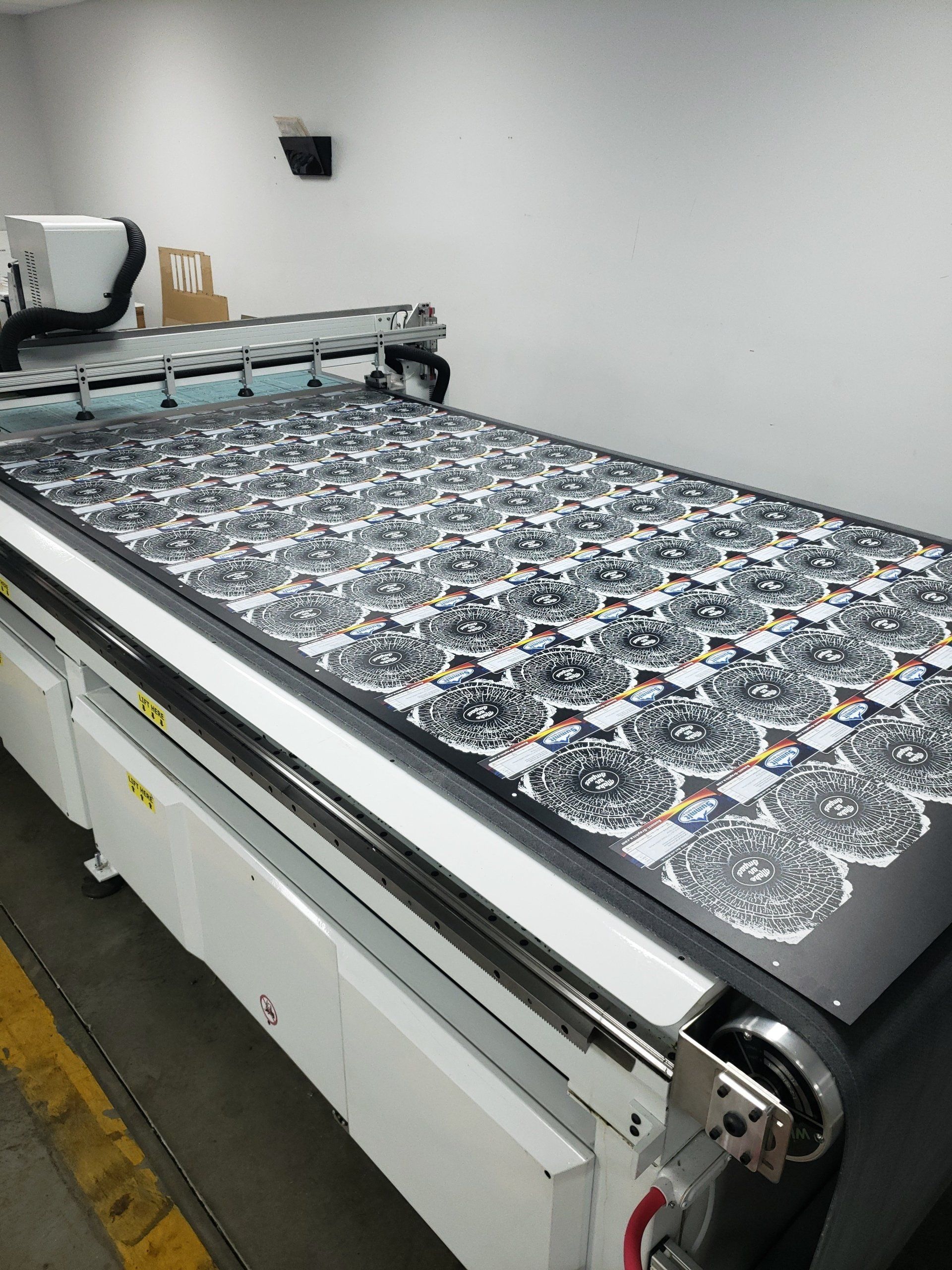 router cutting small company logos
