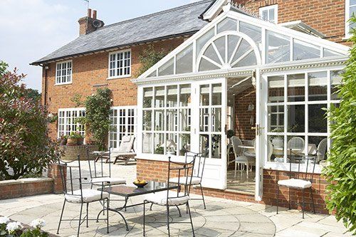 conservatory and patio with furniture
