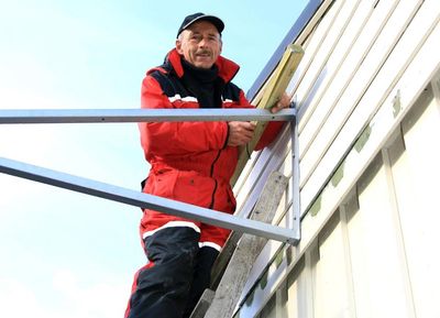 Carpenter on a ladder
