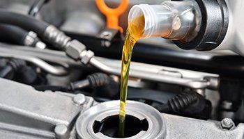 Change Oil — Automotive Services in Moline, IL Change Oil — Automotive Services in Moline, IL