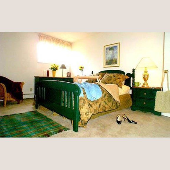 bedroom with light shining in through window