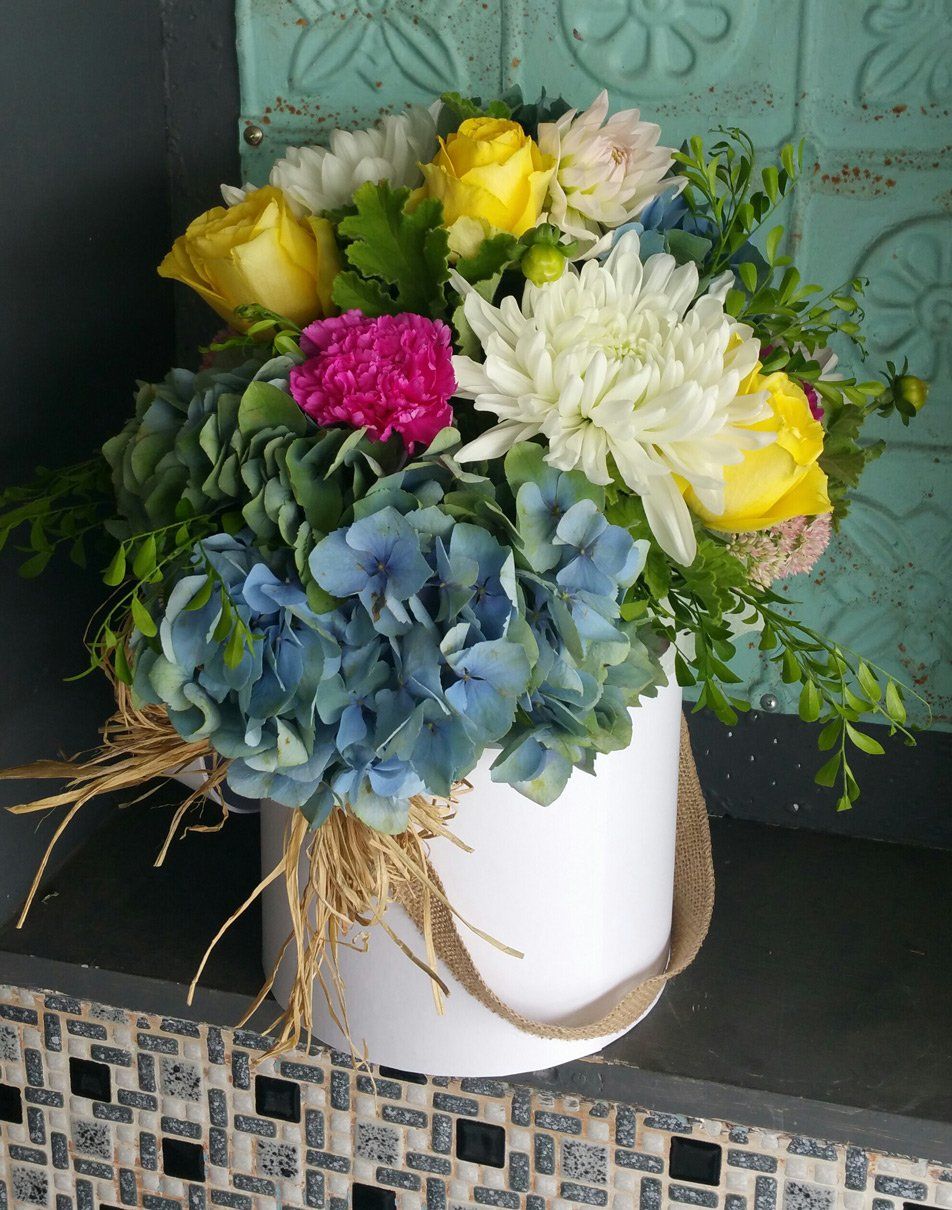 flowers in bucket