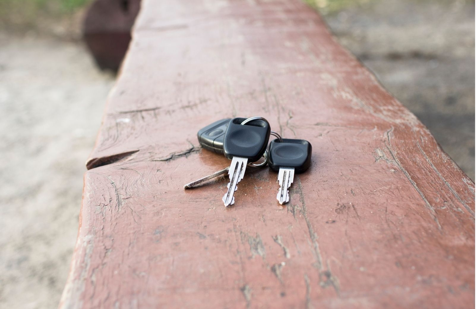 keys on a outdoor wooden seat