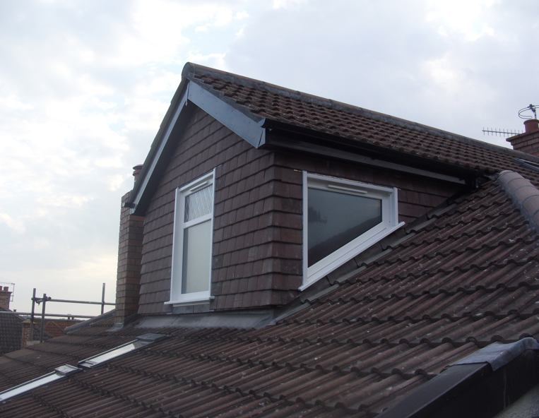 A roof with a window on the side of it