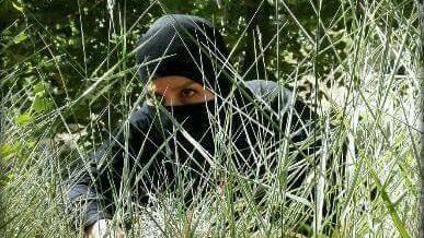 ninja hiding in the brush