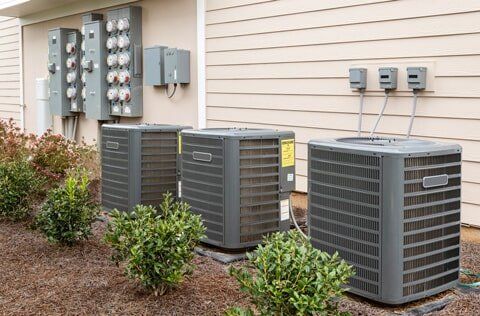 Heating and Cooling — Apartment Air Conditioners and Electric Meters in Racine, WI Heating and Cooling — Apartment Air Conditioners and Electric Meters in Racine, WI