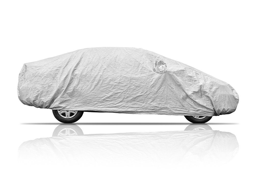 car with cover sheet on