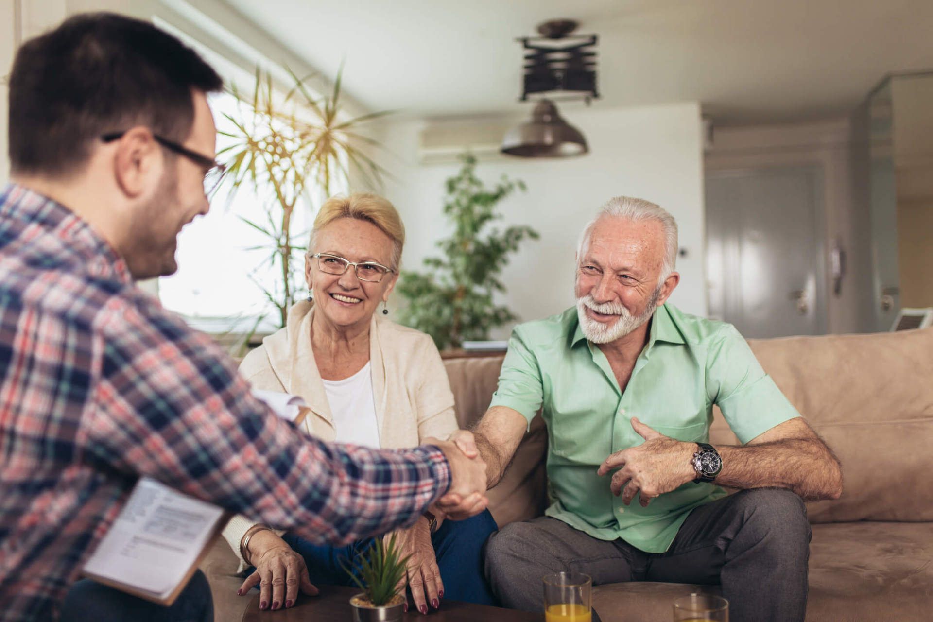 couple talking about transferring their pre-paid funeral plans