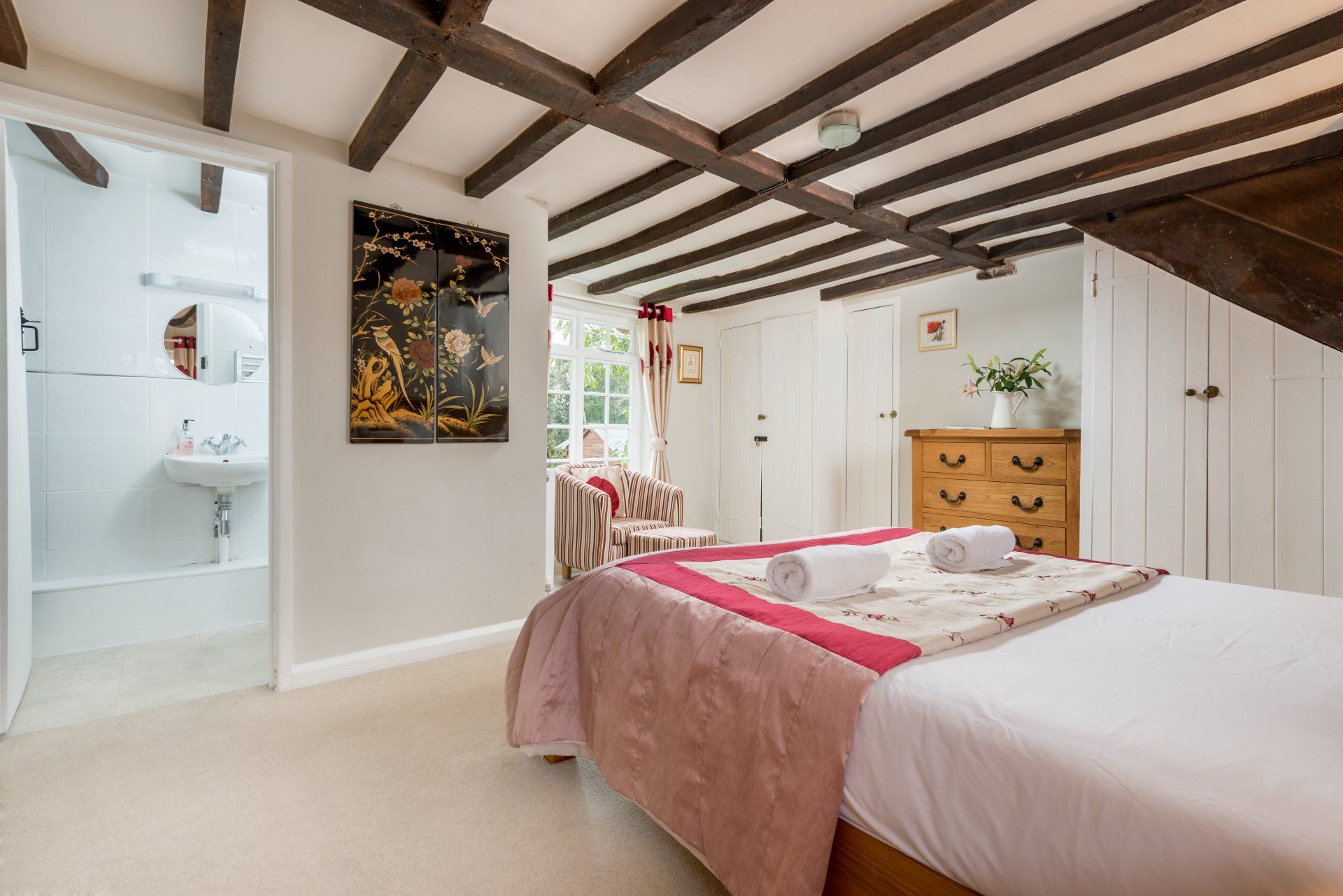 Beamed Thatched Cottage  bedroom in the New Forest