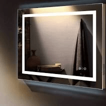 Wall-mounted illuminated mirror with a white border in a dim room