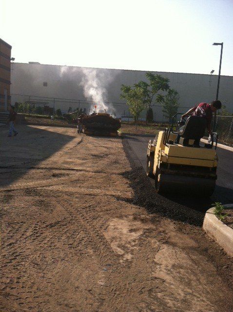 Laying down Blacktop, Asphalt Paving