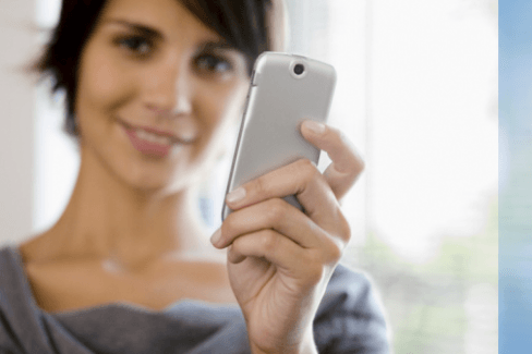 Woman on phone to appliance rental company in Brisbane