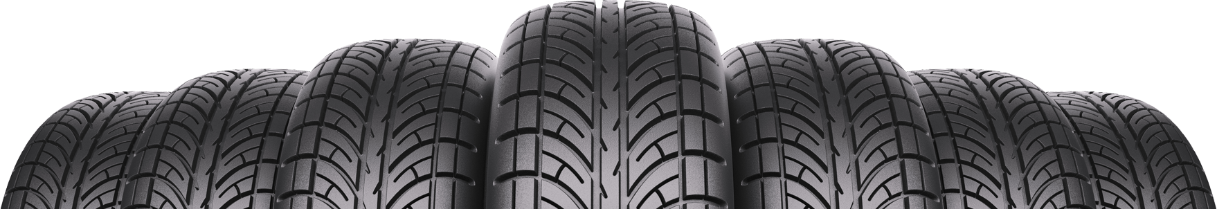 Seven car tires aligned horizontally, showing their treads.