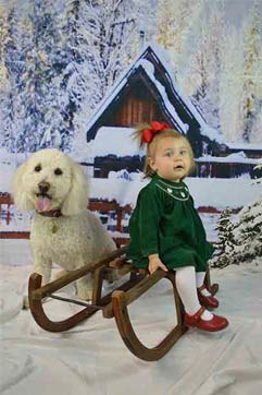 Dog with little girl — Pet Grooming in Huntersville, NC Dog with little girl — Pet Grooming in Huntersville, NC