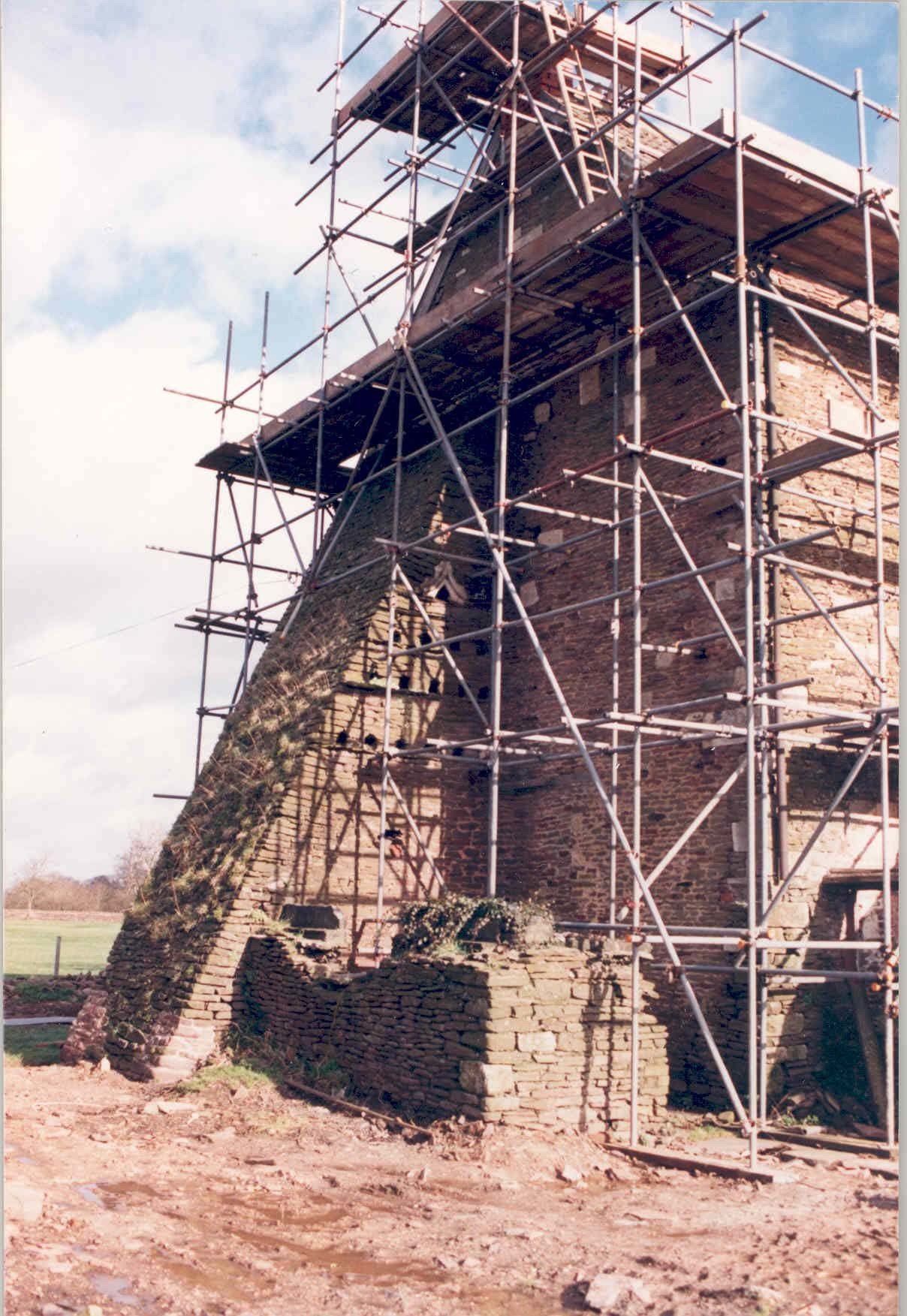 Acton Court with scaffolding on the side of it