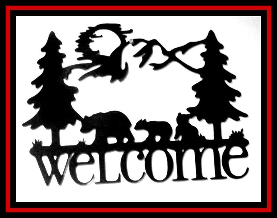 Black silhouette welcome sign with bears, pine trees, sun, and mountains inside a red border.