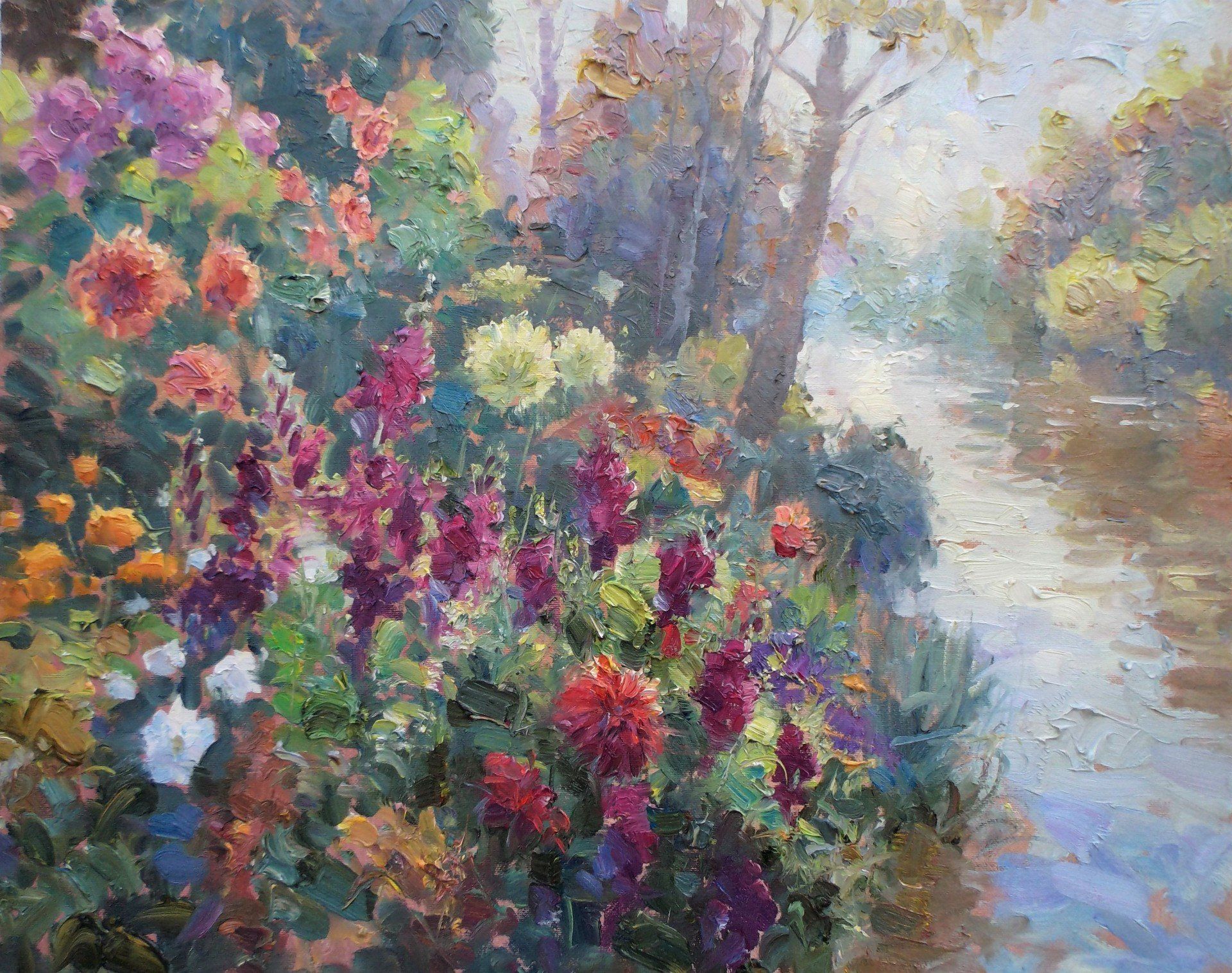 It is a painting of flowers by a river.