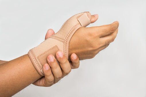 Man with injured arm — Jersey City, NJ — Pain and Disability Institute Man with injured arm — Jersey City, NJ — Pain and Disability Institute