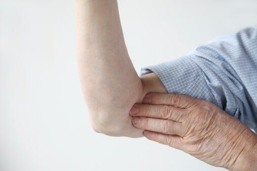 Elderly with elbow pain — Jersey City, NJ — Pain and Disability Institute Elderly with elbow pain — Jersey City, NJ — Pain and Disability Institute