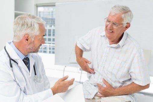 Old man having doctor's checkup — Jersey City, NJ — Pain and Disability Institute