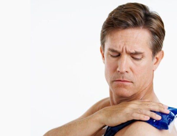 Man with shoulder pain — Jersey City, NJ — Pain and Disability Institute Man with shoulder pain — Jersey City, NJ — Pain and Disability Institute