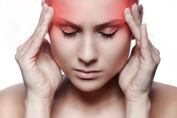 Woman having headache — Jersey City, NJ — Pain and Disability Institute