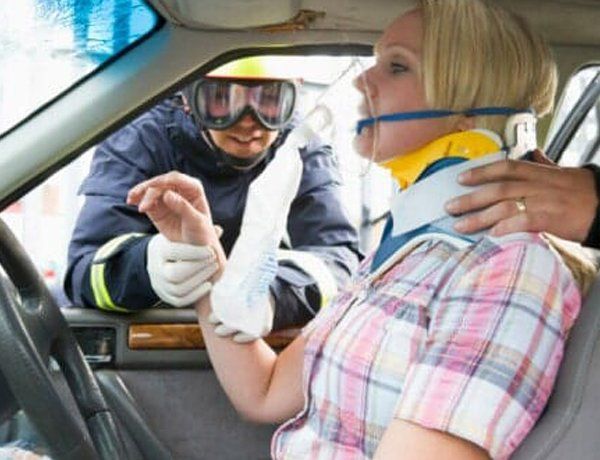 A woman being rescued in a car accident — Jersey City, NJ — Pain and Disability Institute A woman being rescued in a car accident — Jersey City, NJ — Pain and Disability Institute