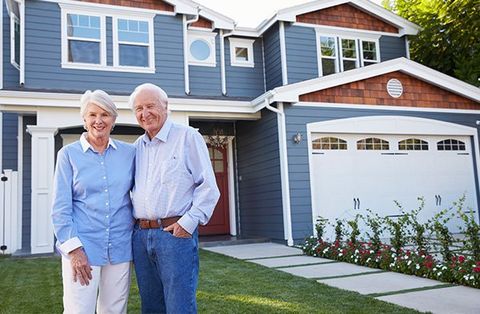 Ambler — Old Couple In Front of New House in Norristown, PA
