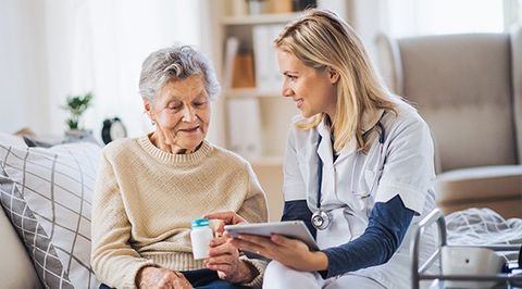 Medicaid Planning — Doctor Explaining Medication For A Senior in Norristown, PA Medicaid Planning — Doctor Explaining Medication For A Senior Woman in Norristown, PA