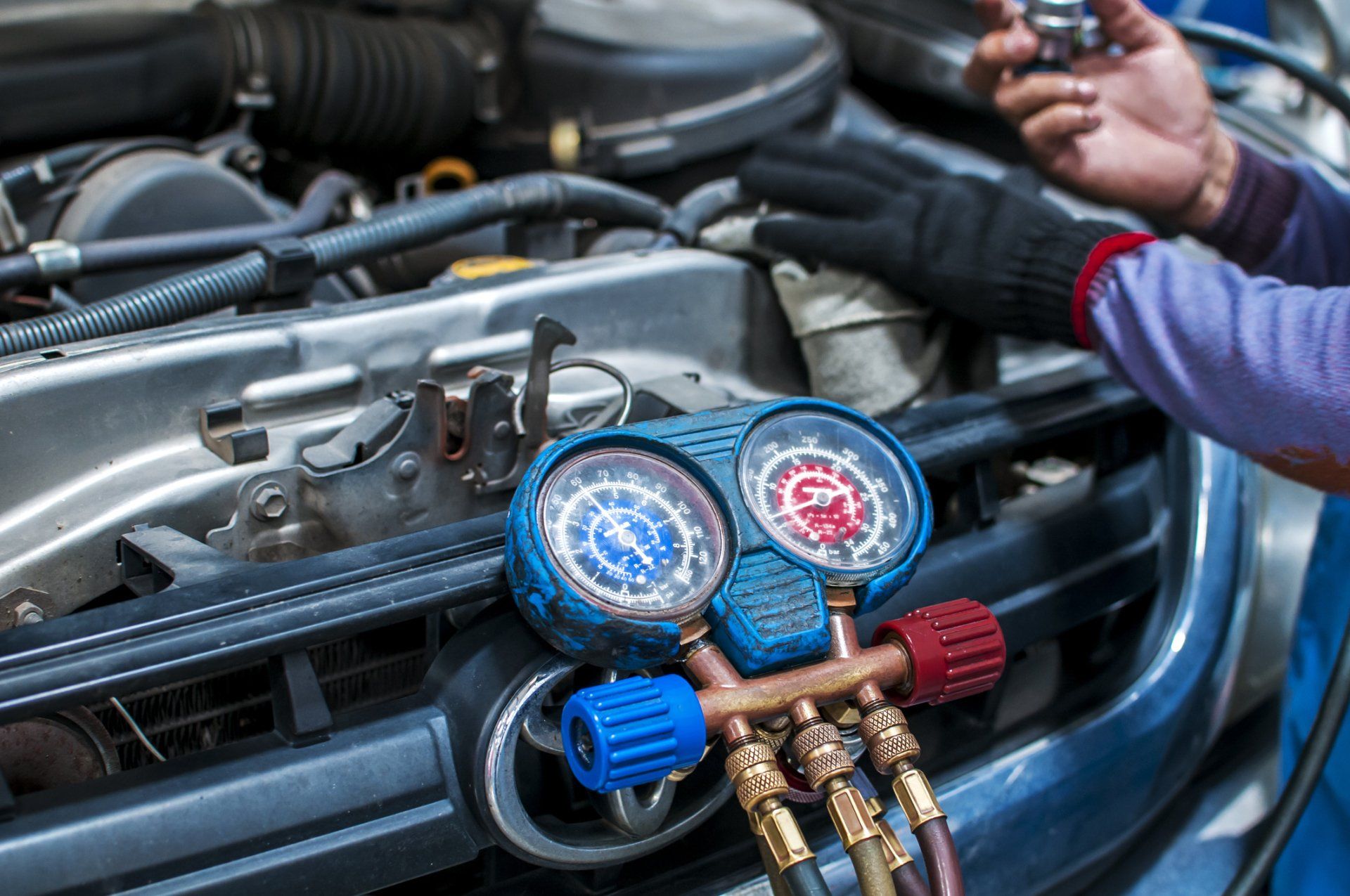 Checking The Air Condition Of A Car — Branford, CT — Paul’s Auto Service