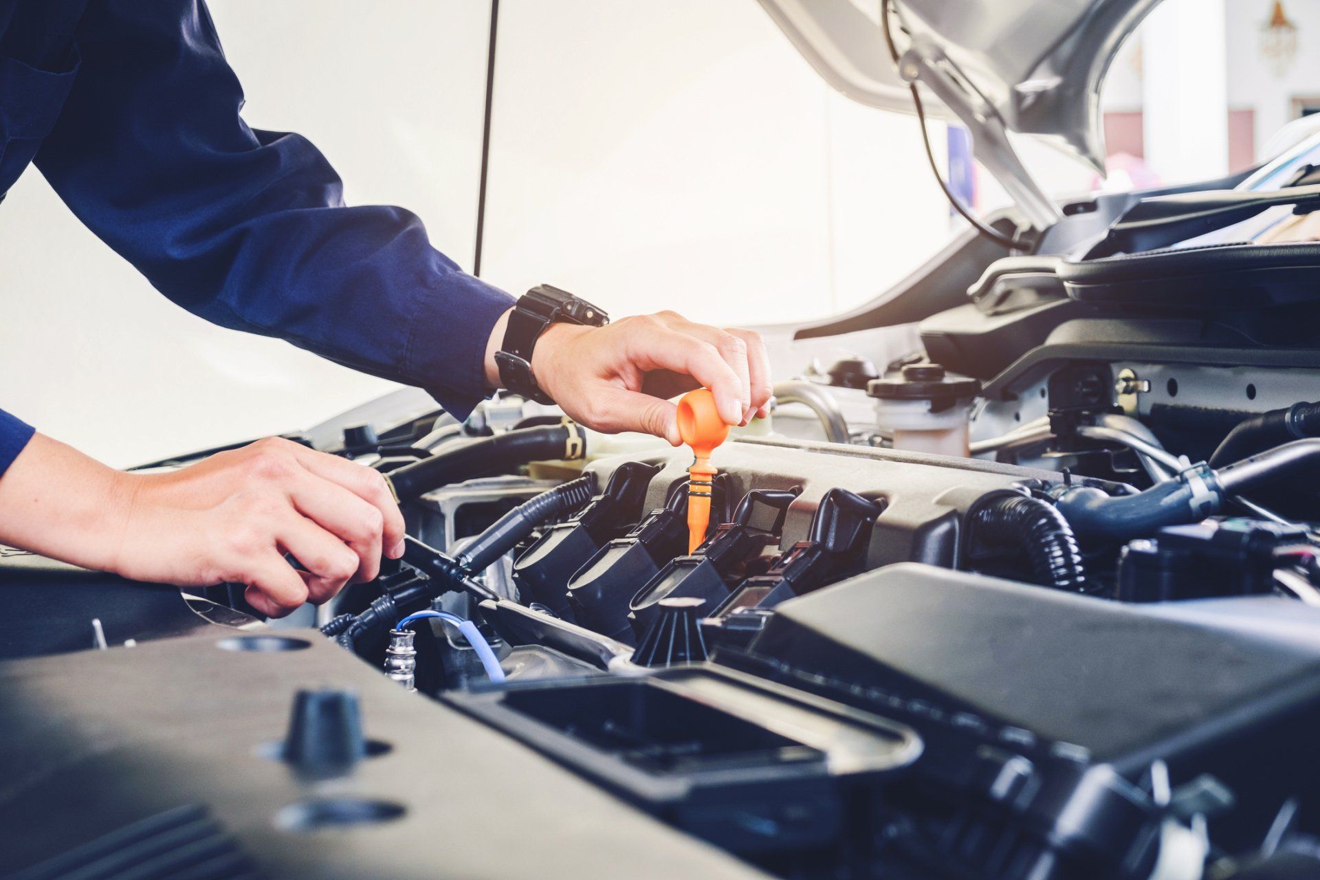 Car Mechanic Working In Auto Repair Service — Branford, CT — Paul’s Auto Service