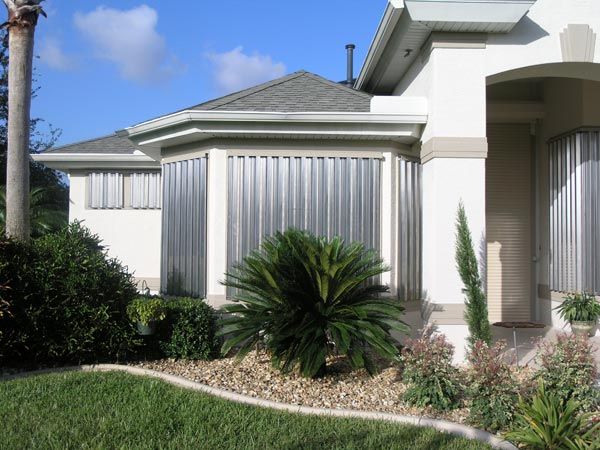 Affordable accordion storm shutters — hurricane shutters Ormond Beach FL in Ormond Beach, FL