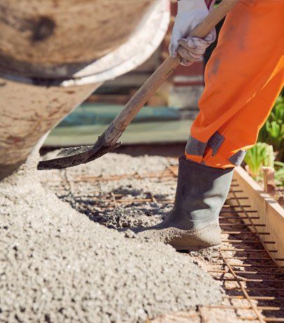 Concrete Pouring During Commercial Concreting Floors — Watertown, SD — B & E Concrete Concrete Pouring During Commercial Concreting Floors — Watertown, SD — B & E Concrete