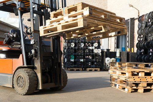 Stacking pallets ready for reselling in Bradford