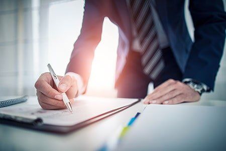 Legal Office — Lawyer Signing Papers in El Paso, TX