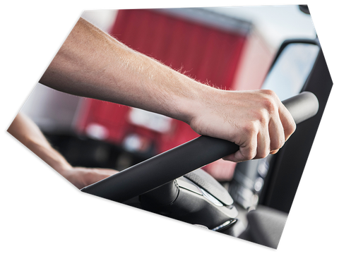 Man driving a truck — Schenectady, NY — James Trauring & Associates, LLC Man driving a truck — Schenectady, NY — James Trauring & Associates, LLC