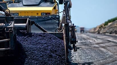Pavement machine laying asphalt—Asphalt Paving in Decatur, IL