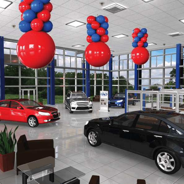 car dealership decorated with balloons