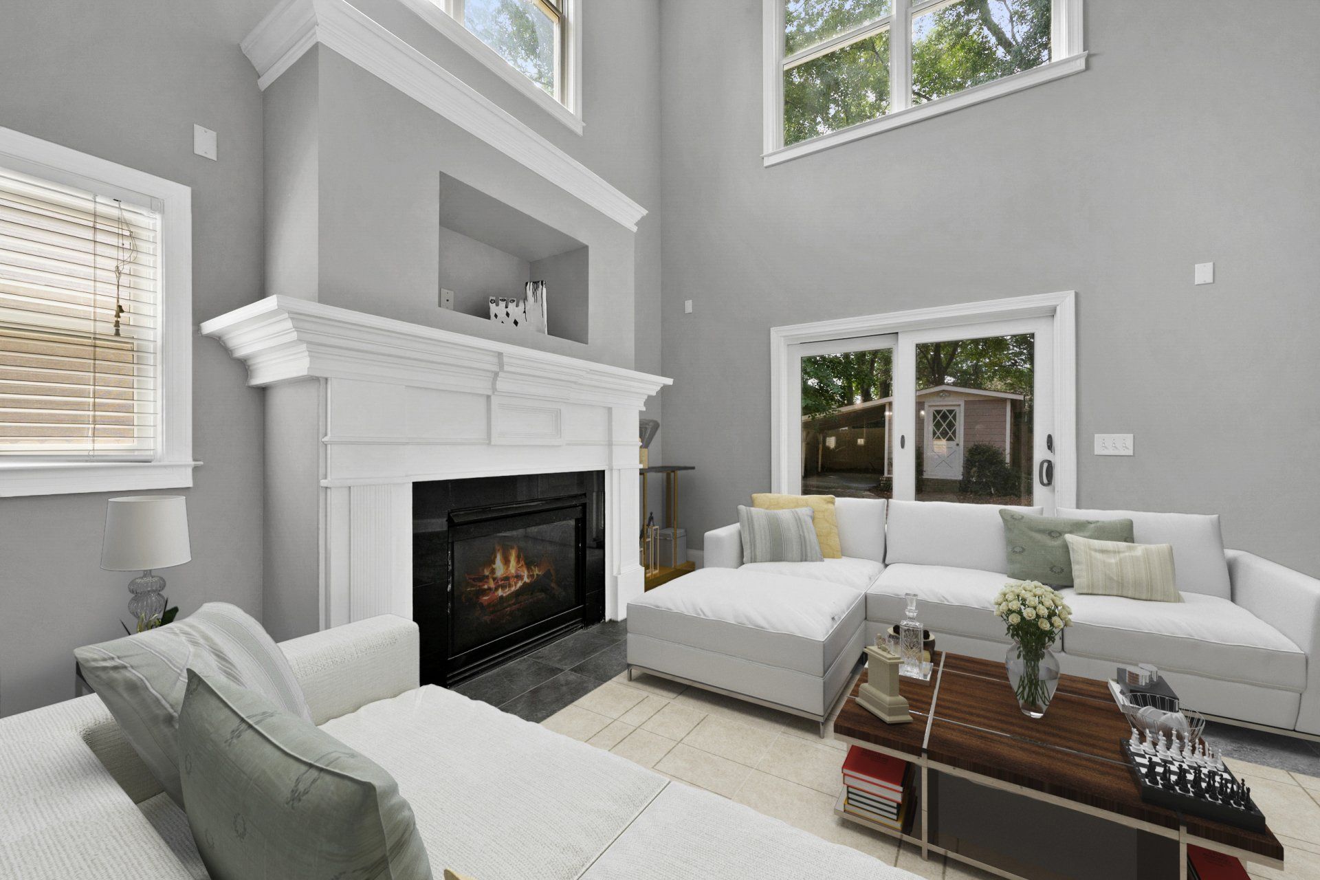 A living room with a fireplace , couch , and coffee table.