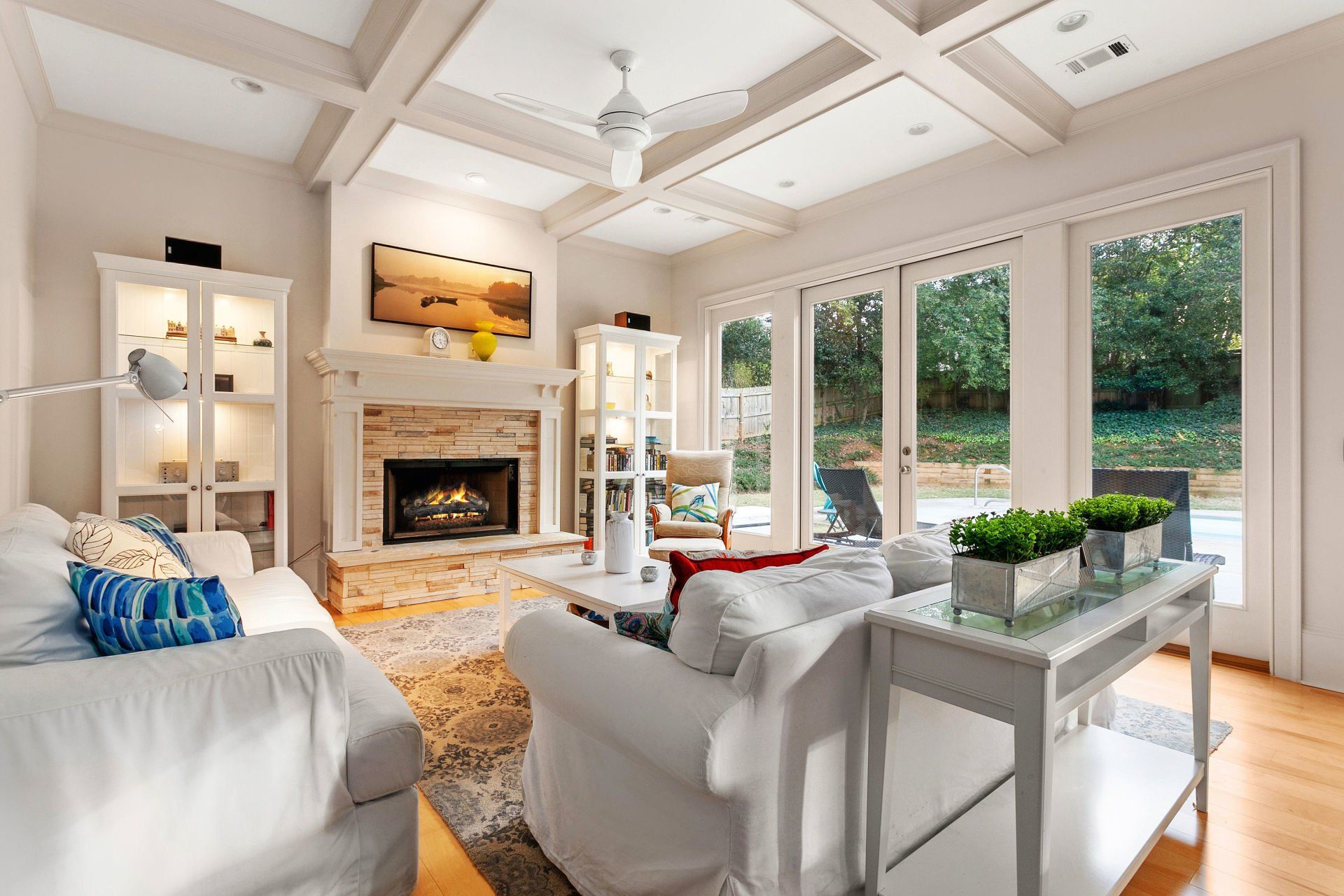 A living room filled with furniture and a fireplace.
