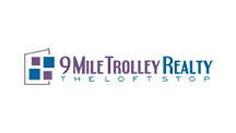 A logo for a real estate company called 9 mile trolley realty.