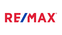 A red , white and blue re / max logo on a white background.