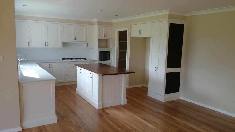 White Wooden Kitchen Cabinetry — Cabinetry Solutions in Balaclava NSW