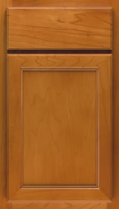 Wooden cabinet door with raised panel and a small upper drawer, shown front view.