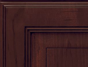 Dark brown wooden panel with layered rectangular trim details