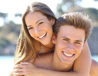 Couple with beautiful smile — Oral Hygiene in Naples, FL Couple with beautiful smile — Oral Hygiene in Naples, FL