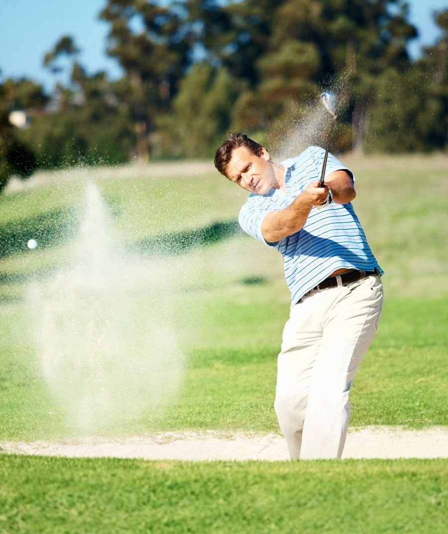 Mature Golfer Hitting out of a Sand Trap — Greensboro, N.C — Merlin Centre For Hypnosis & Enlightenment Mature Golfer Hitting out of a Sand Trap — Greensboro, N.C — Merlin Centre For Hypnosis & Enlightenment