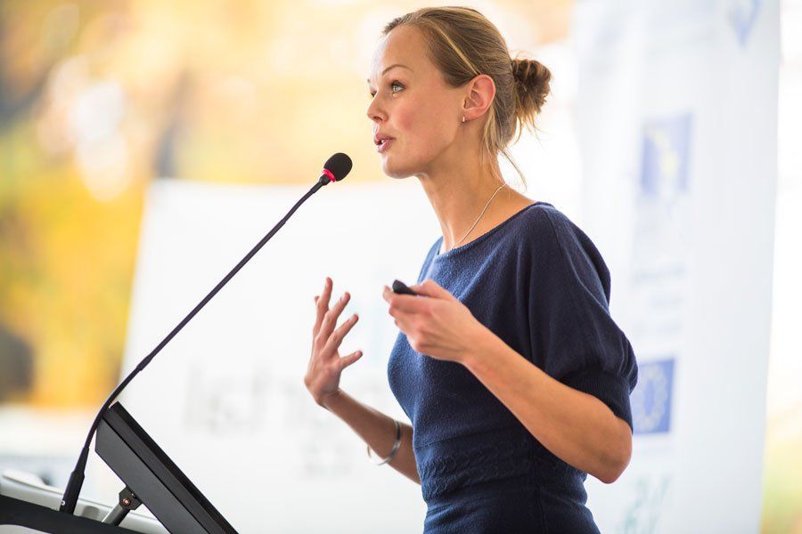 Young Business Woman Giving a Presentation — Greensboro, N.C — Merlin Centre For Hypnosis & Enlightenment Young Business Woman Giving a Presentation — Greensboro, N.C — Merlin Centre For Hypnosis & Enlightenment