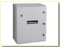 Commercial Slide Gate Operator — Guaranteed Door Service, Inc. Gray metal electrical control cabinet with a red indicator light and black latch on the front